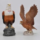 A Beswick model of an eagle, height 16cm, together with a Royal Doulton fish eagle decanter