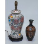 A Chinese cloisonne enamel decorated vase, height 25cm, together with a floral decorated porcelain