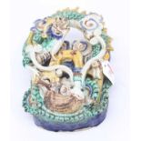 A Chinese polychrome glazed wall pocket, in the form of a dragon, height 25cm