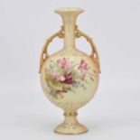 An Austrian blush ivory porcelain vase, of globular form, decorated with flowers, height 24cm