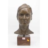 A 20th century bronzed bust of a lady, mounted upon a hardwood plinth, height 49cm