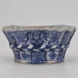 A Delft blue & white bough pot, decorated with scrolls and fruit, width 23cm