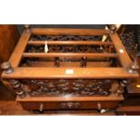 A Victorian walnut three-division canterbury, with single lower drawer, w.60.5cm