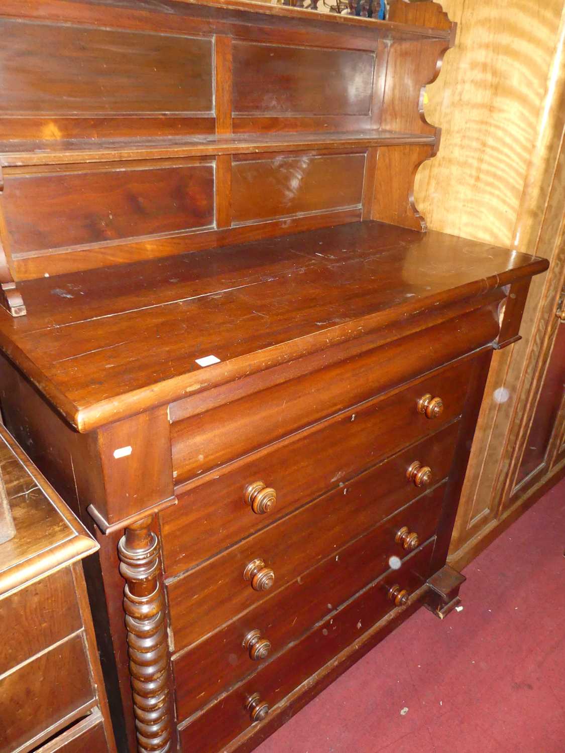 A Victorian Scottish mahogany chest of five long drawers (lacking one bobbin turned column), w.122.