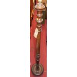 A turned and fluted mahogany standard lamp, h.169cm (excluding fittings)