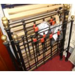 A pair of Victorian wrought iron and brass single bedsteads, with later slatted base sectionsBase