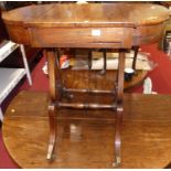 A Regency rosewood work table, having sliding top and twin hinged end compartments, w.73cm