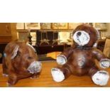 Two contemporary stitched soft tan leather door-stops, one modelled as a teddy-bear and the other as