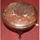 A Victorian mahogany tan leather inset circular music stool, on cast iron base, h.48cm