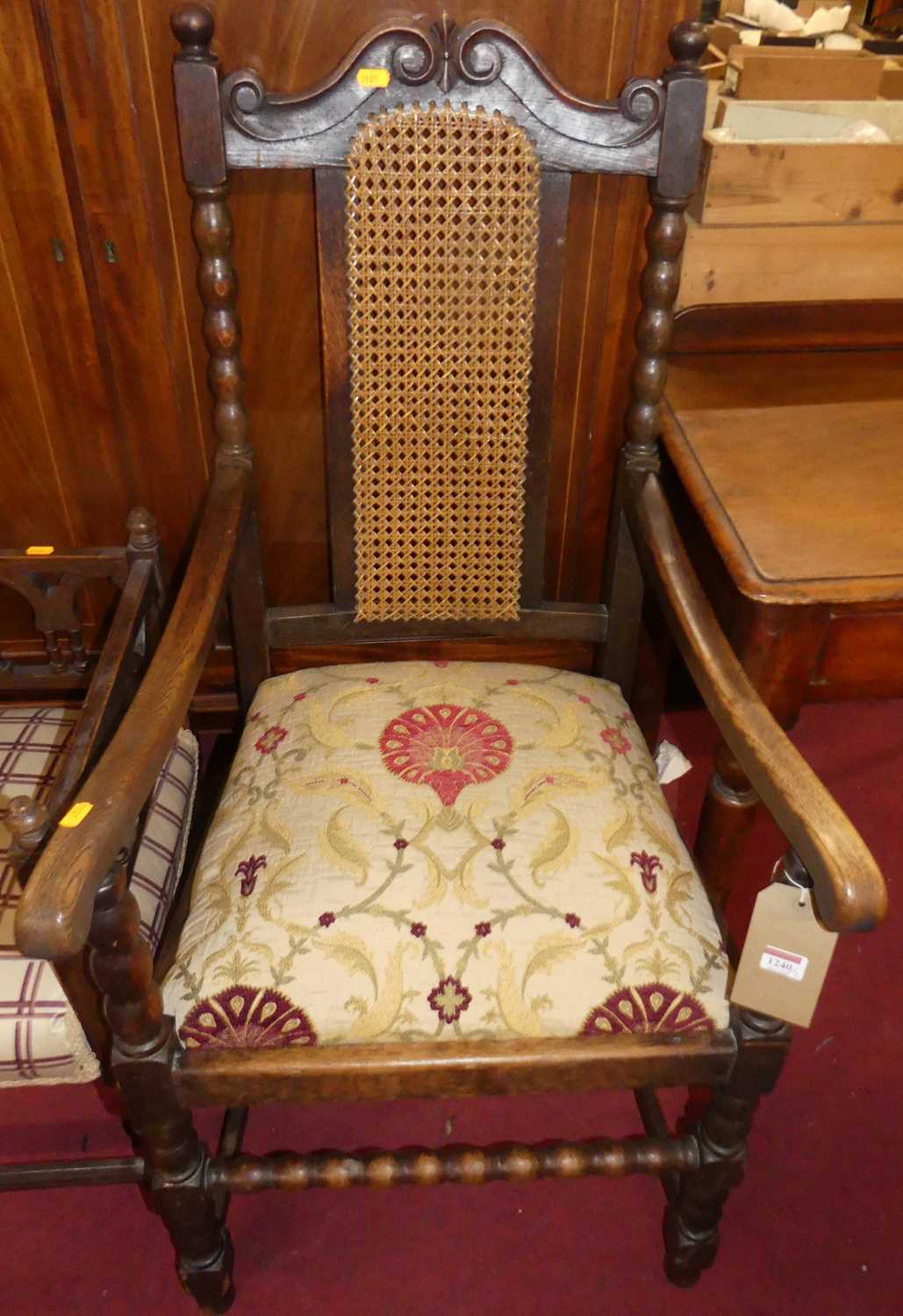 An early 20th century oak elbow chair, with floral needlework drop-in seat; together with an - Image 2 of 3