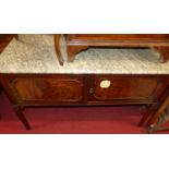 An early 20th century mahogany and variegated marble topped two door washstand, w.126cm; together