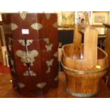 A small Oriental elm and brass octagonal low cupboard; together with a stained softwood and brass