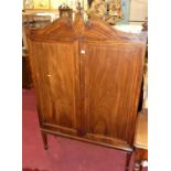 A 19th century mahogany double door cabinet on squat stand, w.107cm