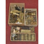 Assorted Quare brass components, to include boxes, sides, heads, bases, and chimney parts