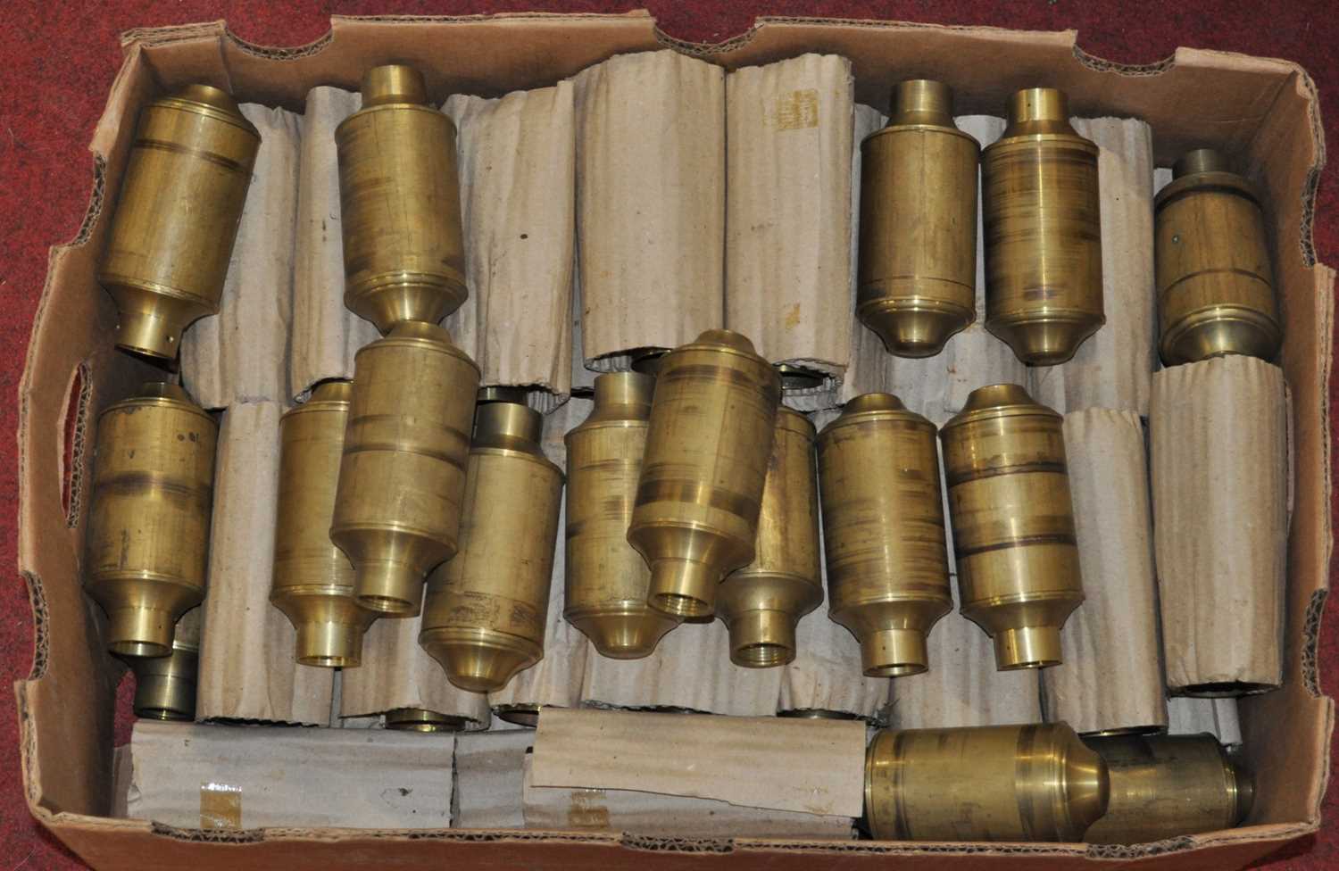 A collection of marine barometer brass cisterns, unpolished