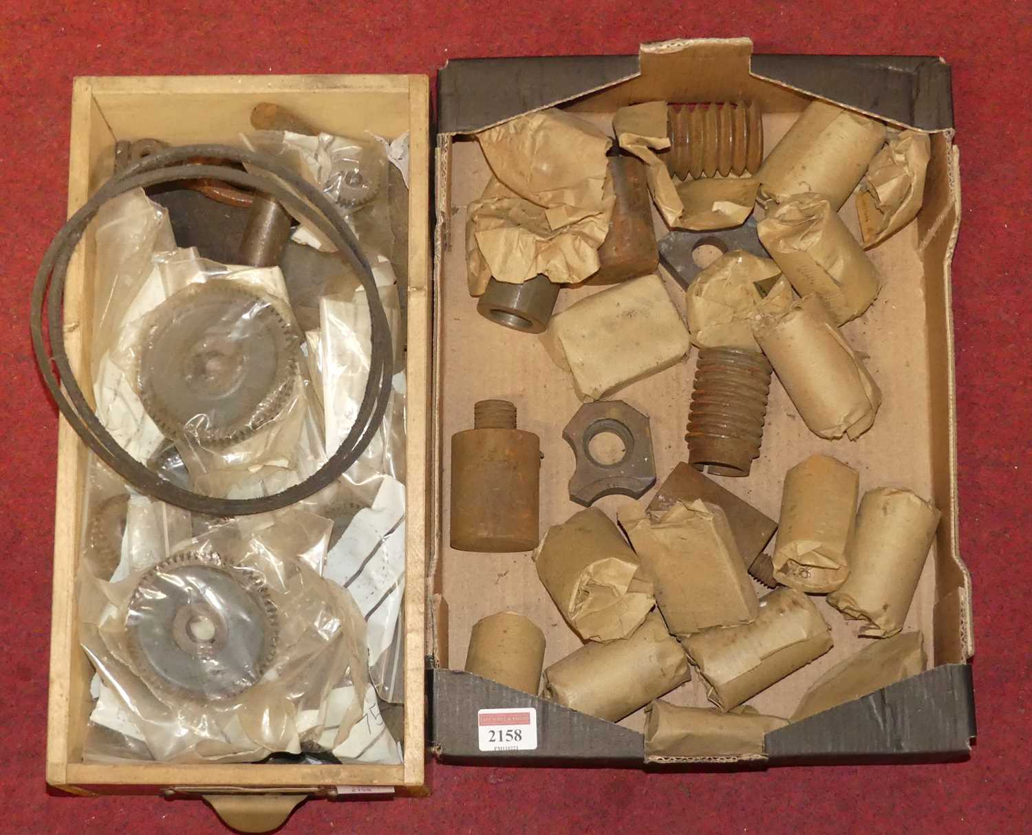 A box of assorted Myford Lathe gears together with other steel components and turnings