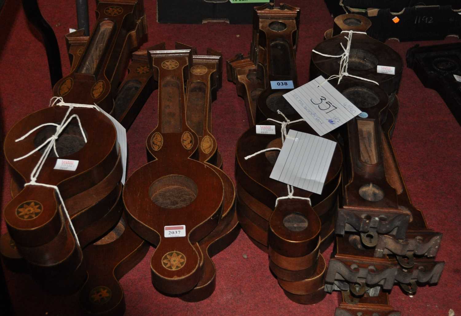 A selection of miniature mahogany and inlaid five and two-dial wheel barometer cases, 60cm (20)