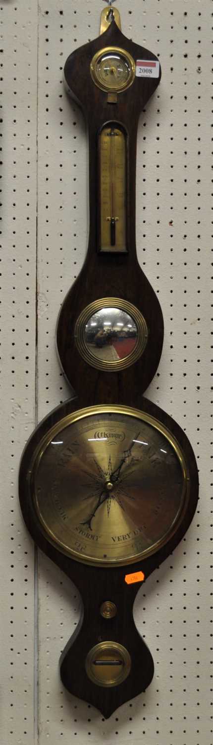 A rosewood five-dial onion topped wheel barometer, having unsigned engraved brass main dial, 93cm