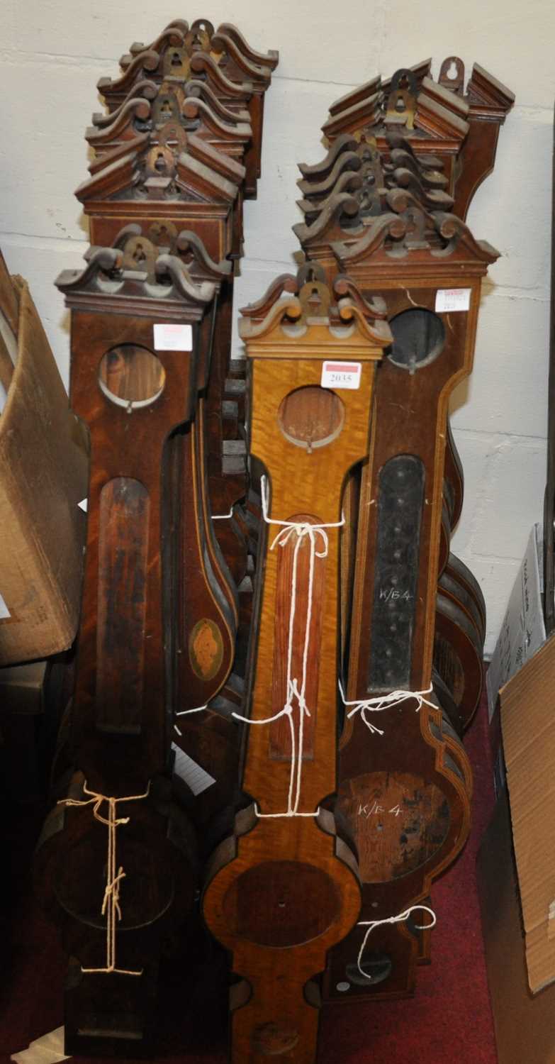 A selection of inlaid mahogany and satinwood wheel barometer cases, some of narrow size for 5" and