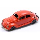 Ingap tinplate and clockwork model of a Volkswagen Beetle, finished in red with IN-35 on number