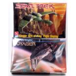 A Star Trek Monogram and AMT/ERTL plastic space ship kit group to include a Star Trek Voyager
