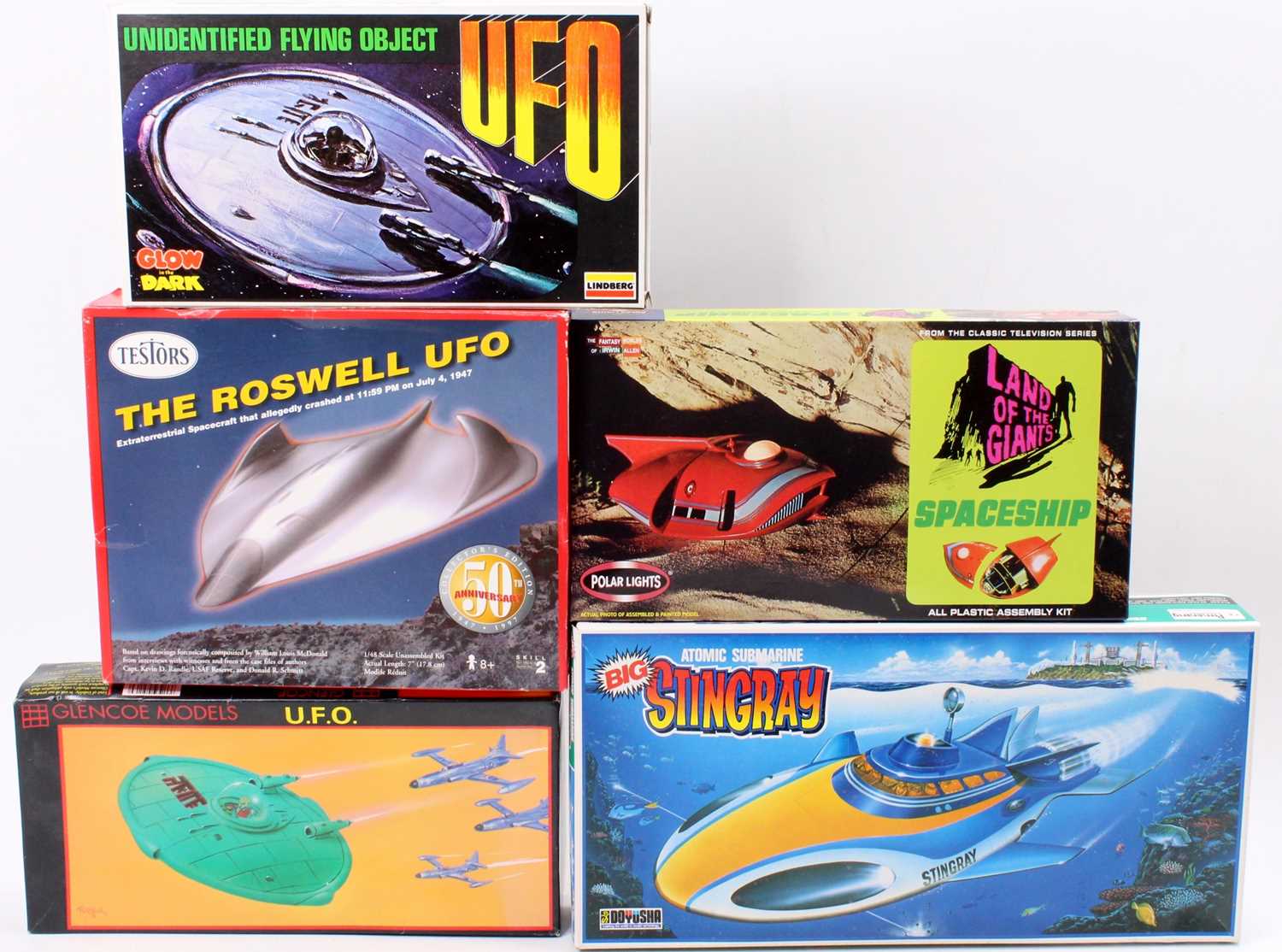 A collection of UFO, sci-fi, and Stingray related boxed space ship and submarine plastic kits to