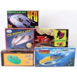 A collection of UFO, sci-fi, and Stingray related boxed space ship and submarine plastic kits to