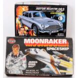 A collection of James Bond 007 plastic kits to include a Doyusha 1/24 scale model of a 007