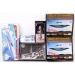 A collection of six space and UFO related boxed plastic kits to include Testors, Revell, Glencoe