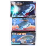 A Star Trek boxed plastic kit group to include a Revell No. 04801 Star Trek Voyager USS Voyager