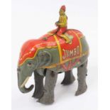 Blomer & Schüler tinplate clockwork Jumbo elephant, light grey body, with rider figure, height