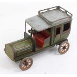 Bing GBN tinplate and clockwork circa 1910 limousine, comprising green body with red and yellow