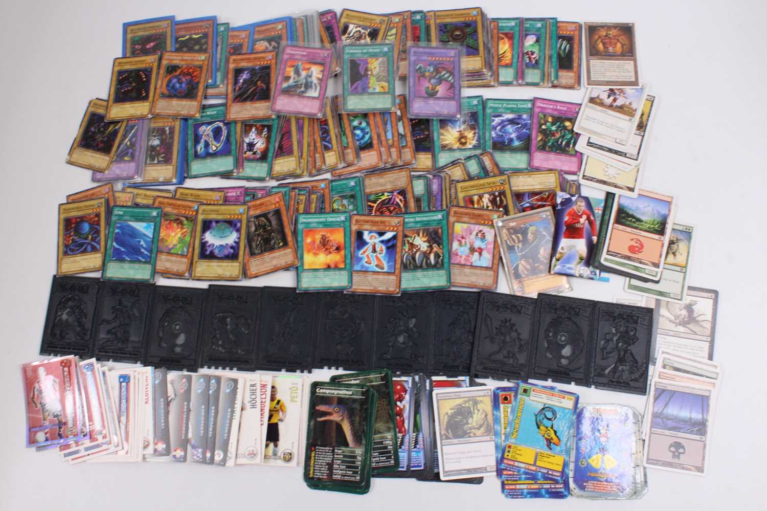 Two trays containing a collection of trading cards to include Yu-gi-oh, Magic The Gathering, various