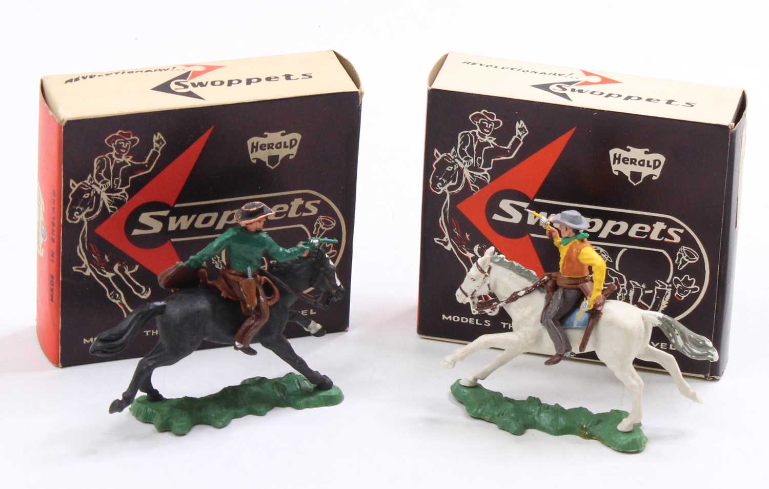 A Herald Swoppets boxed Cowboy figure group, two examples to include No. H630 Cowboy Sherrif