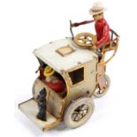 Lehmann (Germany) No.520 Lila Bad Sisters tinplate and clockwork hansom cab, comprising coachman who