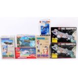 A collection of Thunderbirds, Captain Scarlet and Alfa Moonbase (Space 1999) plastic kit and vinyl