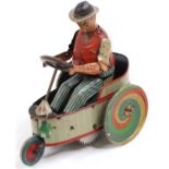 Lehmann (Germany) tinplate and clockwork No.503 Peter 3 wheel car, comprising of grey and red body