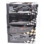 A Minichamps 1/18th scale Formula 1 racing car group of 4 comprising 2x Sauber C12 - one of which as