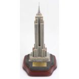 A Danbury Mint scale model of the Empire State building, housed in the original polystyrene packed