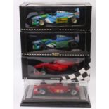 A Minichamps 1/18th scale racing car group of 3 comprising 2x Michael Schumacher Benetton Ford
