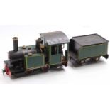 A 32mm scale radio controlled and gas powered locomotive and tender, comprising of 0-4-0 tank loco