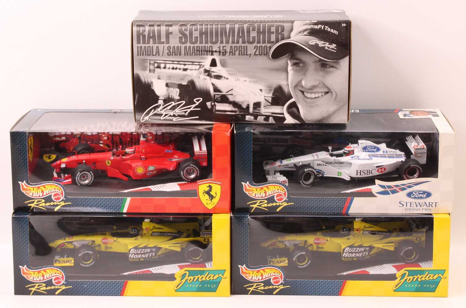 A Hotwheels 1/18 scale boxed Formula One race car group, to include a Ralf Schumacher Imola/San