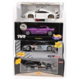 4 various 1/18th scale diecast models, comprising a UT Models Porsche 911 GT1, a Hot Wheels TVR