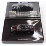 A Minichamps 1/43 scale boxed model of a Bentley State Limousine finished in metallic maroon, housed