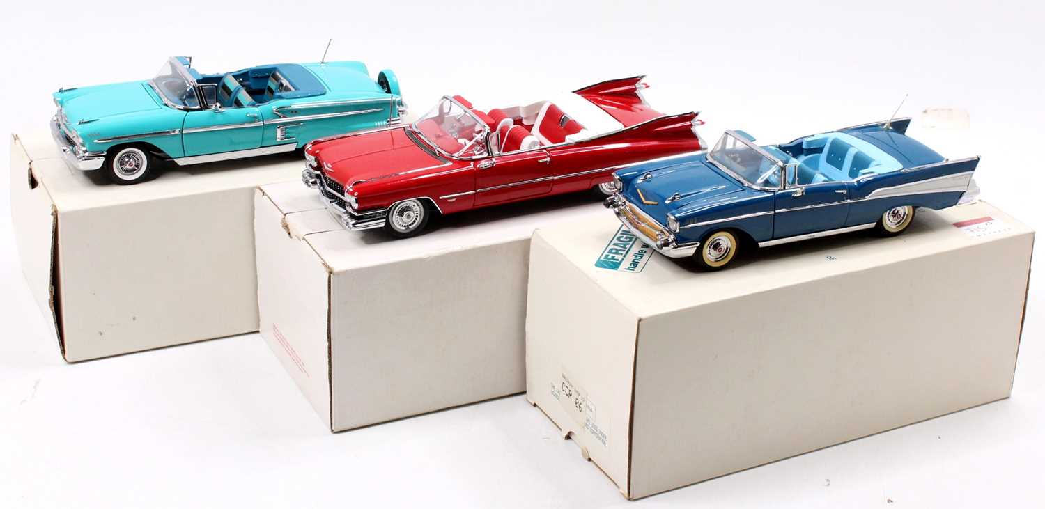 A collection of three boxed Danbury Mint 1/24 scale 1950s American Outline cars, all housed in