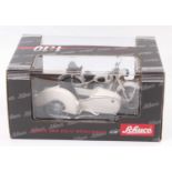 A Schuco 1/10 scale boxed diecast model of a BMW R25/3 motorcycle & sidecar, comprising of cream