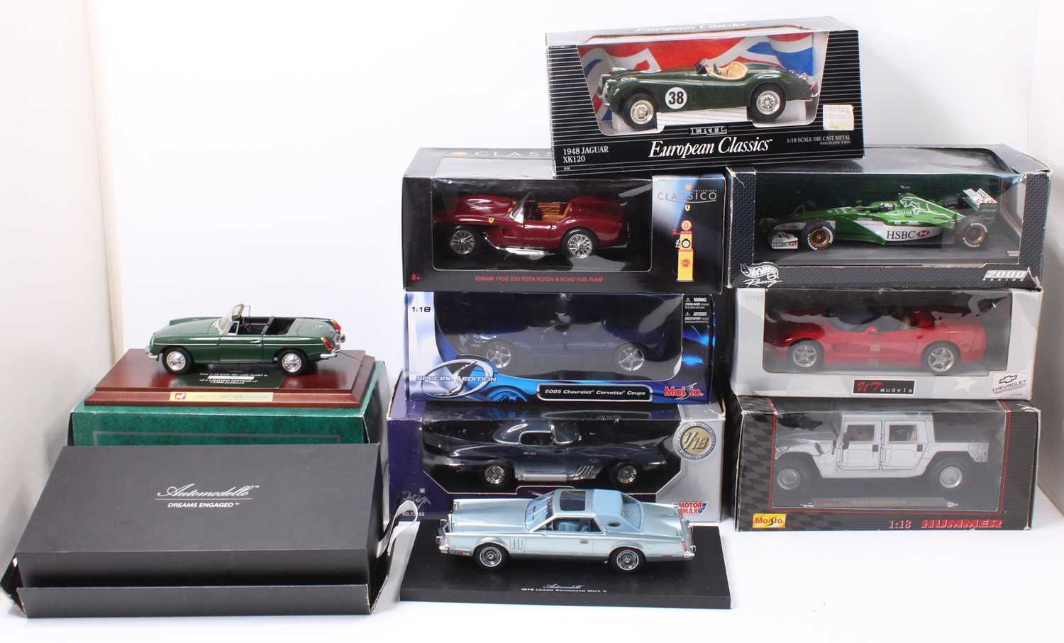 A collection of nine various boxed and part boxes 1/18 scale diecast vehicles to include Corgi,