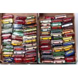 2 trays containing a large quantity of 1/76th scale diecast bus and coach models, with examples