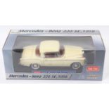 A Sunstar No. 3562 1/18 scale diecast model of a Mercedes Benz 220SE 1958 finished in cream,
