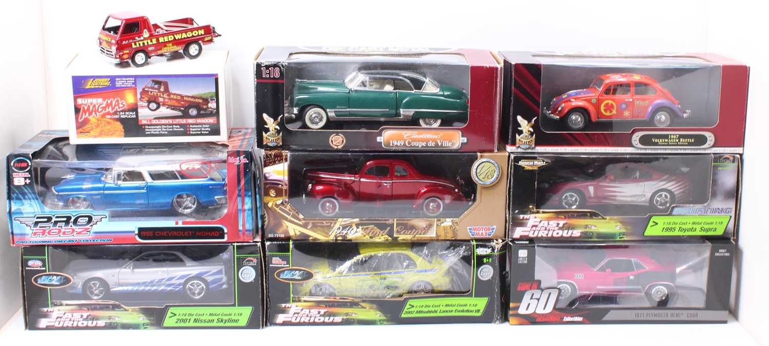 A collection of 9 various boxed 1/18 and 1/24 scale, mainly American interest, diecast vehicles to